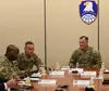 Gen. Charles A. Flynn, right, commander of U.S. Army Pacific, visits with Lt. Gen. Daniel L. Karbler, commanding general of U.S. Army Space and Missile Defense Command, at SMDC’s headquarters