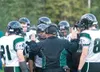 ROBERT DeBERRY/Frontiersman Colony defensive coordinator Jamie
Mayo speaks with his players during the first half of a 20-17 win
over Wasilla last week. Despite the win, Colony dropped from t