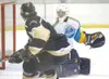 ROBERT DeBERRY/Frontiersman Alaska goalie Kale Robertson turns
away a shot during a game early in the season. Robertson is one of
five Avalanche players slated to compete in the North America