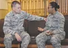 Chap. (Capt.) Greg Lawrence, 28th Bomb Wing chaplain, left, talks with Airman Sadie Colbert, 28th Bomb Wing photojournalist, at Ellsworth Air Force Base, S.D., Jan. 8, 2016. Personnel can use