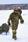 Sgt. Andrew Allen, paratrooper with the 4th Infantry Brigade Combat Team (Airborne), 25th Infantry Division, tests an experimental Airborne Sled to efficiently recover and move his combat equ