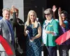 Deni'na Elementary School principal Andrea Everett reacts after successfully cutting the ribbon on Tuesday at the new school site. MATT HICKMAN/Frontiersman