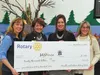 Rotary District Governor Michelle O'Brien, second from left, helps the Wasilla and Palmer Rotary Clubs donate $20,000 raised from the Rotary Uncorked 2016 event to MYHouse in Wasilla. (Submit