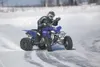 Dillon Boyd, 17, slides through a corner while practicing
Saturday afternoon for today's ice racing event on Big Lake.
(ROBERT DeBERRY/Frontiersman)