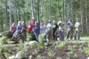 Group of Valley volunteers spent Saturday morning adding plants
to this rain garden they installed at Birch Creek Villas in Meadow
Lakes. The garden is filled with plants that do well, or are
