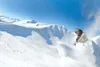 Photo courtesy of Robert DeBerry Professional snowmachiner Dane
Ferguson pushes the limits of backcountry snowmaching with this
large drop while filming for one of the Turnagain Hardcore movi