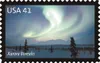The Aurora Borealis is captured above in this new 41-cent stamp
that will be dedicated Monday. Wasilla photographer Fred Hirshmann
captured the image on a cold, -34 degree night in January 20