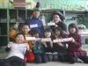 Teacher Sean Holland, back right, with his English language
class on March 11, the same day a 9.0-magnitude earthquake shook
Japan. (Photo courtesy Sean Holland)