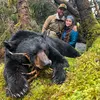 Kyle Wilkinson, his wife Emily, and his spring black bear after a successful hunt near Cordova recently. Kyle Wilkinson/For the Frontiersman