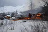 The Motherlode Lodge smolders Friday night. Fire was reported at the Valley landmark about 6 p.m., April 17. Because the fire was outside of fire service areas, officials with the Alaska Divi