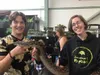 Jonathan's Reptiles owner, Jonathon Huntington (right) poses with a volunteer at the 2021 All Alaska Reptile &amp; Exotics Expo inside the Menard Sports Center. Courtesy photo