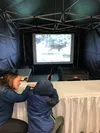 Jeremiah, 11, takes aim at the hunter safety range