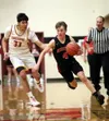Houston's Cole Taylor brings the ball down the court against Mt. Edgecumbe. Bruce Eggleston/matsusports.net