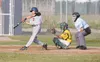 RANDY BOVY/Courtesy photo Kyle Bovy follows through on a base
hit in the second game of a doubleheader for the Alaska Road
Warriors on Friday.