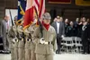 Alaska Military Youth Academy cadets carry the colors onto the drill hall floor at a Veterans Day ceremony at the Alaska National Guard Armory on Joint Base Elmendorf-Richardson, Nov. 11, 202