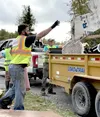 Matt McMines works to help clean up properties in the Williwaw neighborhood on September 13. Katie Stavick/Frontiersman