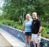 Karen Groendyke and her brother Brian Dobias stand in front of a unique wall made of recycled glass from wine and liquor bottles. Jacob Mann/Frontiersman