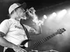 Miles Doughty of Slightly Stoopid smokes a blunt while playing.jpg