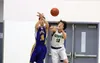 Susitna Valley's Cody Morgan and Redington's Brian Amirault battle for a loose basketball during Redington's win over the Rams Tuesday at Redington. Courtesy of Bruce Eggleston/matsusports.ne