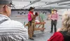 The match director, Paul Brown (left) explaining to the shooters that they must load their shotguns from the shells they place in the bag at the second stage. J. David McChesney/Frontiersman