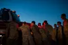 354th Civil Engineer Squadron fire department members propel Tender 85 into the station during a push-in ceremony at Eielson Air Force Base, Alaska, Oct. 15, 2019. The vehicle will act as a p