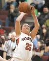 Houston guard Kimberly Quincy shoots for two points against the Codorva Wolverines Thursday at Houston High School. ROBERT DeBERRY/Frontiersman.com