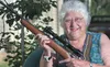 Barbara Shew sits with the .22-caliber rifle she uses for target shooting. Shew hopes to make it to the 2013 International Senior Games in Fairbanks in August. She also shoots with a .22-cali