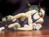 ROBERT DeBERRY/Frontiersman Wasilla Warrior Yuriy Makitrin
fights to keep Colony’s Nate Wolfe on the ground during the
171-pound match at the Wasilla-Colony dual Thursday afternoon at
Wasilla