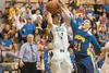 Kodiak's Alec Canete-Hall gets his hand on an Anton Chamblee shot during the Northern Lights Conference championship game March 8 at Colony High. Frontiersman.com