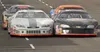 Justin Creech's No. 11 car rides behind Aaron Creech's No. 1 car during a recent race on Alaska Raceway Park's third-mile asphalt oval. Justin Creech won the 30-lap feature race in the late m