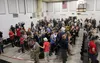 Seventeen legislators entered the Wasilla Middle School gym to a standing ovation from the 200 spectators. Tim Rockey/Frontiersman