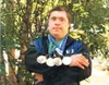 Matt Jaekel displays his medals he earned in the powerlifting
event at the World Games. Submitted photo.