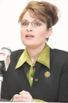 ROBERT DeBERRY/Frontiersman BELOW: Gov. Sarah Palin answers
questions during a town hall meeting Saturday in Wasilla. About 55
people turned out to hear the governor’s plan for the Alaska Gas