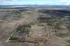 And aerial view photographed by drone in 2022 shows the site of the Middle Lake Unit 1A well in the Matanuska-Susitna Borough that was abandoned and never plugged. The image is a screenshot f