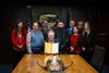 Governor Dunleavy was joined by Senator Donny Olson of Golovin, Representative CJ McCormick of Bethel, DPS Commissioner James Cockrell and MMIP advocates for the bill signing on September 1, 