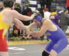 Susitna Valley junior Marshall Pinard grips the left arm of West Valley's Jake Foshee during the semifinal round of the Lancer Smith Memorial Nov. 20 at Palmer High School. Pinard pinned Fosh