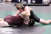 Colony's Caleb Hopkins works to turn Ketchikan's Brandon Wieber during a dual against the Kings Nov. 3, 2017, at Colony High School. Hopkins pinned Wieber in the second round. The following d