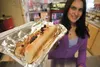 Marcie’s Mojo owner Marcie O’Neill serves up a delicious variety of gourmet hot dogs at her Palmer-Wasilla Highway location. From bacon blue cheese topped with cranberries to the Chicago dog 