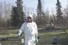 Robert Doran of Nuisance Wildlife Management wears a Tyvek suit
with boots and hood, as well as a full-face respirator with
suitable cartridges, to protect against possible contaminants
assoc
