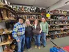 Charlie and Nancy Willis pose for a photo with their staff members Kathleen Brown and Mallory Manier. Jacob Mann/Frontiersman