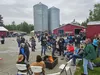 Community members socialize during the 2024 Save Farms! event hosted by the Alaska Farmland Trust. Jacob Mann/Frontiersman