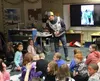 Ryan Redington visits with Snowshoe Elementary School students. Jacob Mann/Frontiersman