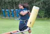 Junior Aumavae works out with a blocking sled on the Palmer High School practice field in this 2012 file photo. Aumavae recently finished a workout with the Green Bay Packers. ROBERT DeBERRY/