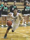 Colony senior Isaiah Neuner, seen here driving toward the baseline during a win over Palmer earlier this year, scored a game-high 19 points to lead his team to a 58-47 win over Kenai Central 