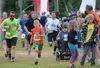 Zac Cheyette, wearing bib number 2251, runs in the Anchorage Mayor’s Midnight Sun Half-Marathon June 20, 2015. The Palmer 10-year-old finished the race in 2 hours, 1 minute and 55 seconds. Co