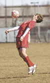 ROBERT DEBERRY/Frontiersman file photo Wasilla’s Kyler Perry
settles the ball during a win over Seward last year. Perry is back
to help Wasilla try to return to the state tournament. Also
ret