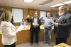 Wasilla City Clerk Kristie Smithers swears in new Wasilla City Council members Steven Lovell, A. Clark Buswell III and Brandon Wall following the October 2012 general election. Lovell was arr