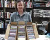 Assistant Manager Jeanne Novosad holds up a portion of the
Palmer Public Library's new CD music stash. Photo by JOEL
DAVIDSON/Frontiersman.