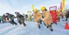 The three race teams make a mad dash from the start line at the 2025 Willow Winter Carnival Outhouse Race on Willow Lake. Frontiersman file photo