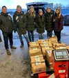 Employees from CU1 took time on Giving Tuesday to donate food to the Mat-Su Food Bank. Photo courtesy CU1